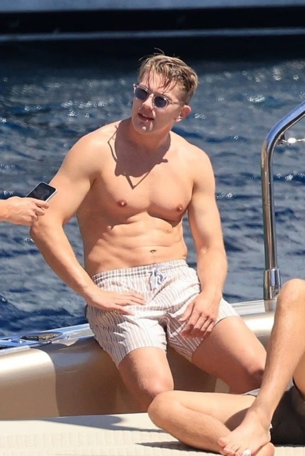Post: Yorke is photographed sunbathing in Greece, waiting for an offer from Arsenal and Manchester United